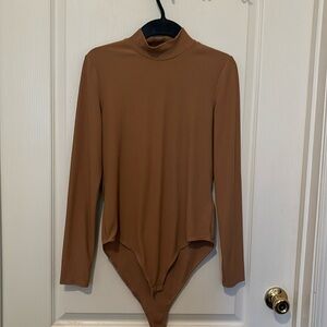 H&M women’s nude body suit.